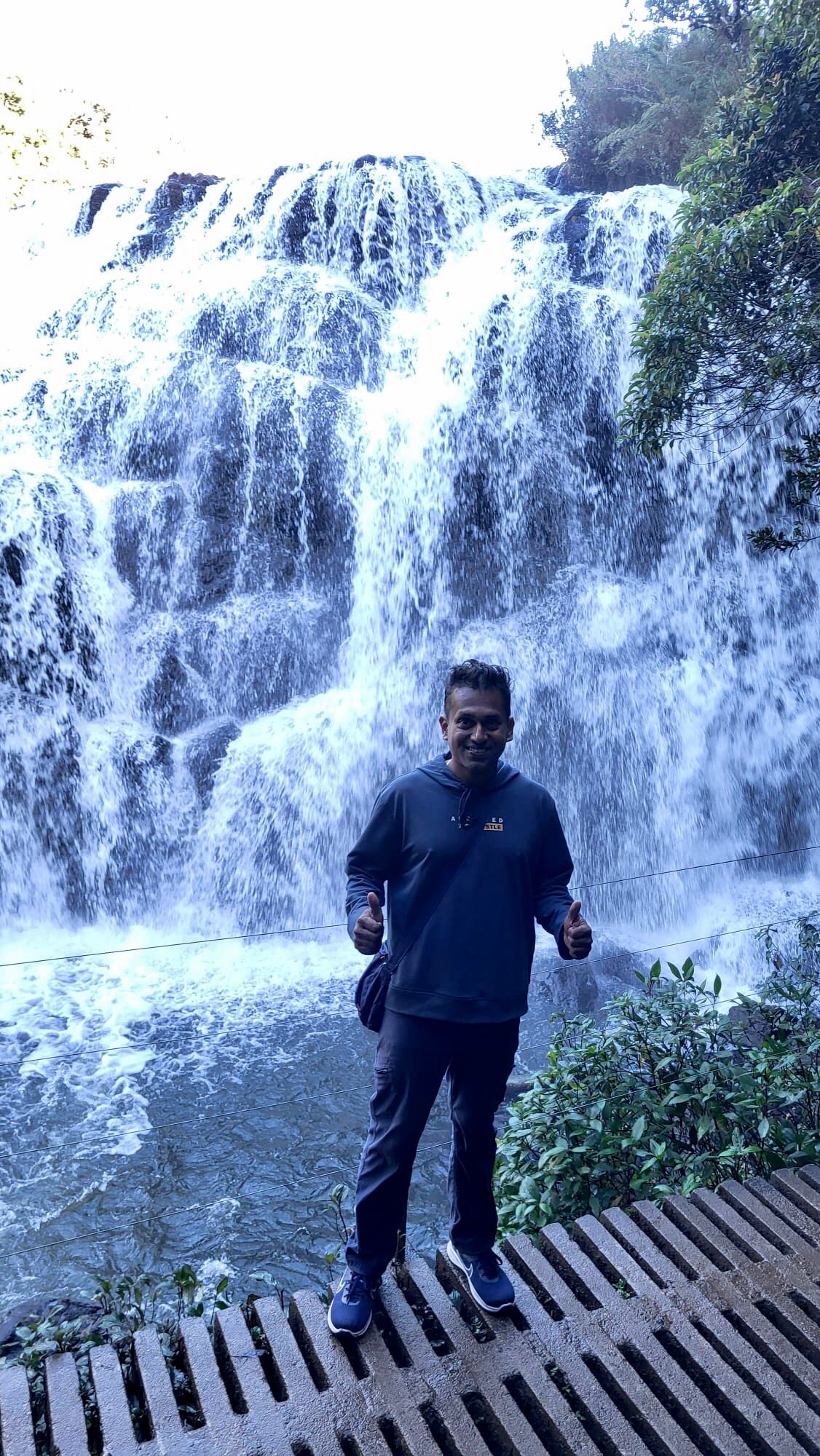 Oshi under the water fall